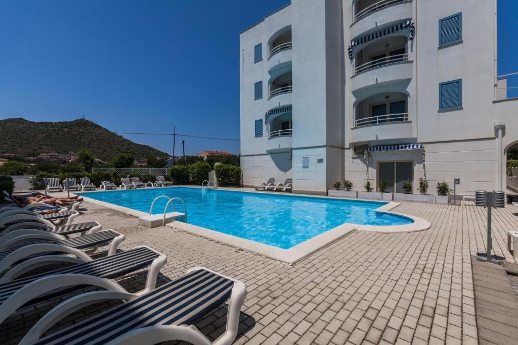 Hotel Residence Hibiscus La Caletta Exterior foto